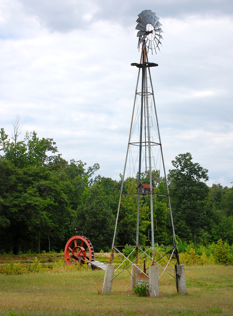 Windmill and waterwheel by Donald Lee Pardue